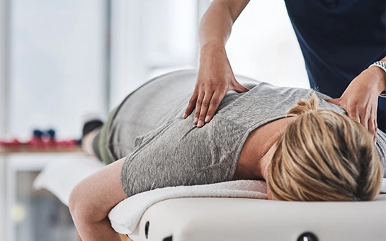 Chiropractic Phoenix AZ Woman Receiving Adjustment